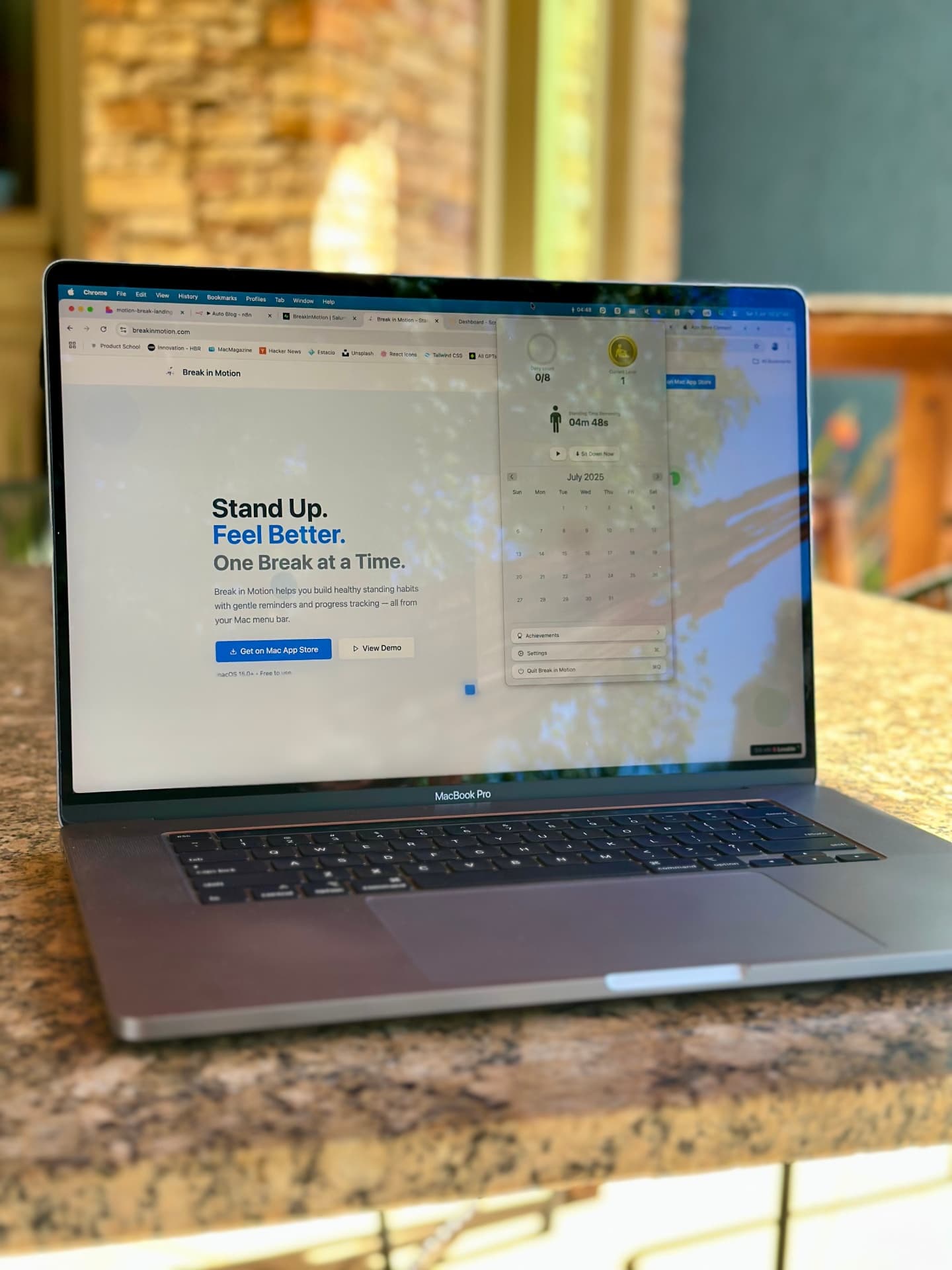 Break in Motion running in the menu bar of a MacBook Pro on a kitchen counter